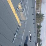 Drabina bez kosza z przejściem przez attykę